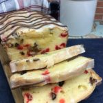 Cherry Garcia Frosted Cake Sliced on Cutting Board